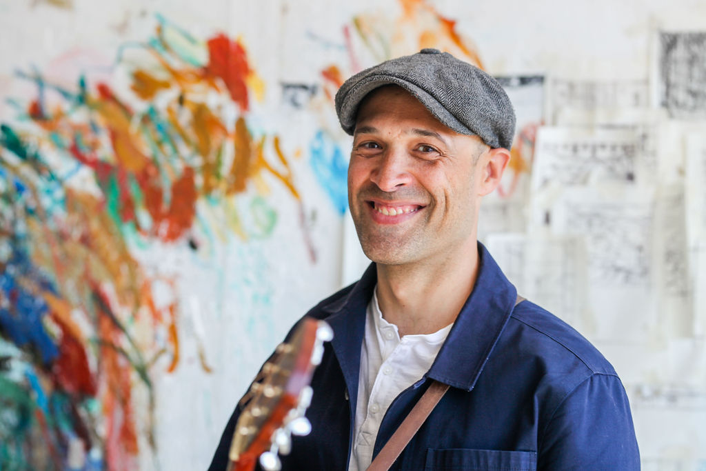 A photo of Phil King smiling at the camera